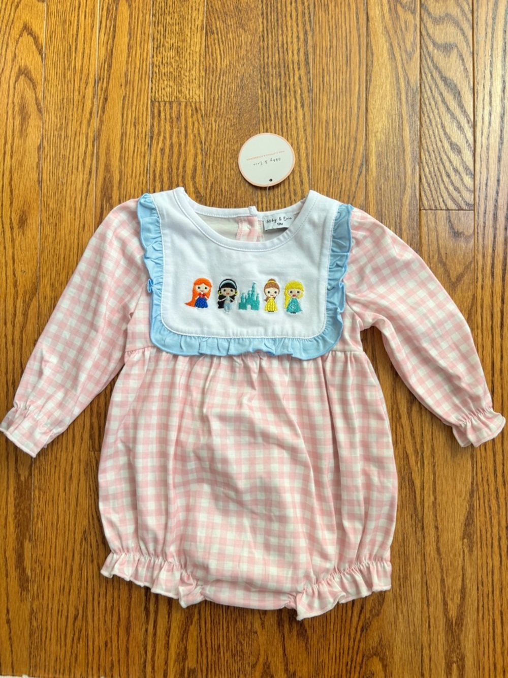 Abby & Evie pink gingham romper w/Princess characters embroidered size 12 months